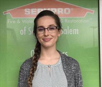 Female employee with long brown hair 